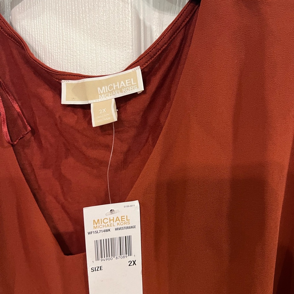 Bright rust colored Michael Kors top